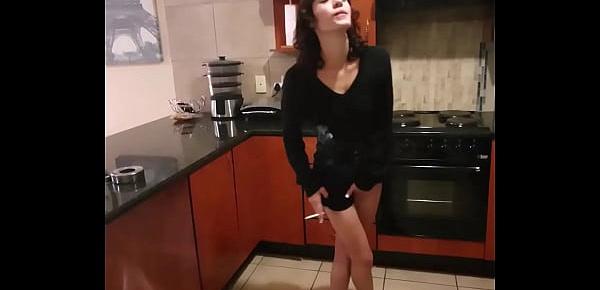  Skinny brunette pissing in her white panties while smoking a cigarette
